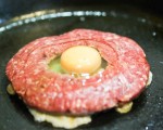 A beef burger with an egg in the middle recipe